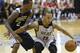 Miami Heat's Shabazz Napier (13) makes a move to get around Indiana Pacers' Dee Bost (2) during an NBA summer league basketball game in Orlando, Fla., Thursday, July 10, 2014. (AP Photo/John Raoux)