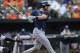 Tampa Bay Rays' Ben Zobrist follows through on a single against the Baltimore Orioles in the fifth inning of a baseball game Friday, June 27, 2014, in Baltimore.(AP Photo/Gail Burton)