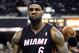 FILE - In this Dec. 27, 2013 file photo, Miami Heat forward LeBron James reacts after scoring and drawing a foul against the Sacramento Kings during the first half of an NBA basketball game, in Sacramento, Calif. The wait continues for the next decision. At stake for LeBron James: Where he plays for the next few seasons, and which fan base _ the already-scorned one in Cleveland or the panicked one in Miami _ will undoubtedly feel alienated by whatever choice his latest foray into free agency leads him to make. (AP Photo/Steve Yeater, File)