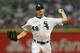 CHICAGO, IL - MAY 28: Starting pticher Chris Sale #49 of the Chicago White Sox delivers the ball against the Chicago Cubs at U.S. Cellular Field on May 28, 2013 in Chicago, Illinois. (Photo by Jonathan Daniel/Getty Images)