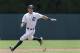 Detroit Tigers' Ian Kinsler rounds second base against the Los Angeles Dodgers in the first inning of a baseball game in Detroit, Wednesday, July 9, 2014. (AP Photo/Paul Sancya)