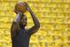 Indiana Pacers guard Lance Stephenson shoots before Game 5 of the NBA basketball Eastern Conference finals against the Miami Heat, in Indianapolis on Wednesday, May 28, 2014. (AP Photo/Michael Conroy)