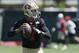 San Francisco 49ers quarterback Colin Kaepernick passes during NFL football minicamp in Santa Clara, Calif., Thursday, June 19, 2014. (AP Photo/Jeff Chiu)