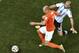 Netherlands' Arjen Robben (11) is challenged by Argentina's Javier Mascherano (14) during the World Cup semifinal soccer match between the Netherlands and Argentina at the Itaquerao Stadium in Sao Paulo, Brazil, Wednesday, July 9, 2014. (AP Photo/Francois Xavier Marit, Pool)