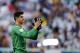 Belgium's goalkeeper Thibaut Courtois greets fans at the end of the World Cup quarterfinal soccer match between Argentina and Belgium at the Estadio Nacional in Brasilia, Brazil, Saturday, July 5, 2014. Argentina won 1-0. (AP Photo/Thanassis Stavrakis)