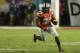 Ohio State running back Carlos Hyde (34) runs during the first half of the Orange Bowl NCAA college football game against Clemson, Friday, Jan. 3, 2014, in Miami Gardens, Fla. (AP Photo/Wilfredo Lee)