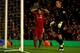 LIVERPOOL, ENGLAND - OCTOBER 22: Luis Suarez of Liverpool reacts after John Ruddy of Norwich City saved his attempt on goal late in the game during the Barclays Premier League match between Liverpool and Norwich City at Anfield on October 22, 2011 in Liverpool, England. (Photo by Richard Heathcote/Getty Images)