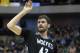 Minnesota Timberwolves forward Kevin Love (42) watches his shot during the first half an NBA basketball game against the Dallas Mavericks Wednesday, March 19, 2014, in Dallas. (AP Photo/LM Otero)