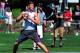 Jul 10, 2014; Beaverton, OR, USA; Apocalypse quarterback Blake Barnett (12) passes the ball during Nike Football ' The Opening' at Nike World Headquarters. Mandatory Credit: Steve Dykes-USA TODAY Sports