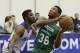 Boston Celtics' Marcus Smart (36) goes to the basket as he is defended by Detroit Pistons' Ian Miller during an NBA summer league basketball game in Orlando, Fla., Wednesday, July 9, 2014. (AP Photo/John Raoux)