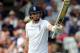 England's Joe Root celebrates after scoring a half century during day three of the first Test between England and India at Trent Bridge cricket ground, Nottingham, England, Friday, July 11, 2014. (AP Photo/Rui Vieira)