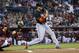 Miami Marlins' Giancarlo Stanton hits against the Arizona Diamondbacks during the first inning of a baseball game, Wednesday, July 9, 2014, in Phoenix. (AP Photo/Matt York)