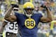 FILE - In this Oct. 20, 2013, file photo, Green Bay Packers' Jermichael Finley reacts after catching a pass during the first half of an NFL football game against the Cleveland Browns, in Green Bay, Wis. Finley has tweeted that he left the intensive care unit and had full feeling in his arms and legs after injuring his neck in a game. Finley posted Monday night, Oct. 21, 2013, on Twitter that he was able to walk to and from the shower. He thanked family, friends, teammates and fans for an outpouring of support. (AP Photo/Morry Gash, File)