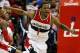 WASHINGTON, DC - APRIL 27: Trevor Ariza #1 of the Washington Wizards celebrates after scoring a key basket late in the fourth quarter against the Chicago Bulls in Game Four of the Eastern Conference Quarterfinals during the 2014 NBA Playoffs at the Verizon Center on April 27, 2014 in Washington, DC. Washington won the game 98-89. NOTE TO USER: User expressly acknowledges and agrees that, by downloading and or using this photograph, User is consenting to the terms and conditions of the Getty Images License Agreement. (Photo by Win McNamee/Getty Images)