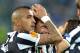 Juventus midfielder Claudio Marchisio, center, celebrates after scoring with teammate Arturo Vidal during the Europa League quarterfinal soccer match between Juventus and Olympic Lyon at the Juventus stadium, in Turin, Italy, Thursday, April 10, 2014. (AP Photo/ Massimo Pinca)