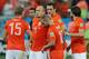 SAO PAULO, BRAZIL - JULY 09: Wesley Sneijder and Arjen Robben of the Netherlands react with teammates after being defeated in a penalty shootout by Argentina during the 2014 FIFA World Cup Brazil Semi Final match between the Netherlands and Argentina at Arena de Sao Paulo on July 9, 2014 in Sao Paulo, Brazil. (Photo by Dean Mouhtaropoulos/Getty Images)