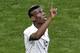 France's Paul Pogba celebrates after scoring the opening goal during the World Cup round of 16 soccer match between France and Nigeria at the Estadio Nacional in Brasilia, Brazil, Monday, June 30, 2014. (AP Photo/Hassan Ammar)