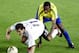 Germany's Miroslav Klose (11) and Brazil's Roque Junior battle for the ball during the 2002 World Cup final Sunday, June 30, 2002, in Yokohama, Japan. (AP Photo/David Guttenfelder)