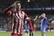 Atletico's Adrian Lopez celebrates after scoring his sides first goal of the game during the Champions League semifinal second leg soccer match between Chelsea and Atletico Madrid at Stamford Bridge stadium in London, Wednesday, April 30, 2014. (AP Photo/Matt Dunham)