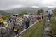 The pack with Spain's Alberto Contador, left, and Italy's Vincenzo Nibali, wearing the overall leader's yellow jersey, climbs during the eighth stage of the Tour de France cycling race over 161 kilometers (100 miles) with start in Tomblaine and finish in Gerardmer, France, Saturday, July 12, 2014. (AP Photo/Christophe Ena)