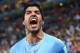 SAO PAULO, BRAZIL - JUNE 19: Luis Suarez of Uruguay celebrates after scoring his team's second goal during the 2014 FIFA World Cup Brazil Group D match between Uruguay and England at Arena de Sao Paulo on June 19, 2014 in Sao Paulo, Brazil. (Photo by Julian Finney/Getty Images)