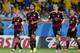 Germany's Philipp Lahm, Sami Khedira, Thomas Mueller and Miroslav Klose, from left, smile after their team scored during the World Cup semifinal soccer match between Brazil and Germany at the Mineirao Stadium in Belo Horizonte, Brazil, Tuesday, July 8, 2014. (AP Photo/Frank Augstein)