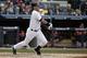 New York Yankees Derek Jeter reacts as he hits into a third-inning, run-scoring, double play in the Yankees home baseball opener against the Baltimore Orioles at Yankee Stadium in New York, Monday, April 7, 2014. (AP Photo/Kathy Willens)