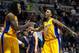 Nov 29, 2013; Auburn Hills, MI, USA; Los Angeles Lakers small forward Nick Young (0) and center Jordan Hill (27) celebrate their win over the Detroit Pistons at The Palace of Auburn Hills. Lakers won 106-102. Mandatory Credit: Tim Fuller-USA TODAY Sports