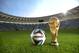 RIO DE JANEIRO, BRAZIL - DECEMBER 03: A general view of Brazuca and the FIFA World Cup Trophy at the Maracana before the adidas Brazuca launch at Parque Lage on December 3, 2013 in Rio de Janeiro, Brazil. Brazuca is the Official Match Ball for the FIFA World Cup 2014 Brazil. Tonight adidas revealed brazuca to the world in the stunning setting of Parque Lage in Rio de Janeiro. The reveal was part of a spectacular light projection supported by global footballers Seedorf, Hernane and FIFA World Cup Winner Cafu. Hundreds of guests and celebrities were treated to this one off experience, which launched the Official FIFA World Cup Ball for Brazil 2014. For more information visit: news.adidas.com/worldcupOMB (Photo by Alexandre Loureiro/Getty Images for adidas)
