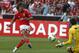 Benfica's Lazar Markovic, from Serbia, scores past Gil Vicente's goalkeeper Adriano Fachini, right, from Brazil, during their Portuguese league soccer match at Benfica's Luz stadium in Lisbon, Sunday, Aug. 25, 2013. Markovic scored once in Benfica's 2-1 win. (AP Photo/Francisco Seco)
