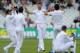 England's James Anderson, centre, celebrates after bowling India's Ravindra Jadeja caught Matt Prior, bottom right, for 31 runs during day five of the first Test between England and India at Trent Bridge cricket ground, Nottingham, England, Sunday, July 13, 2014. (AP Photo/Rui Vieira)