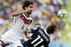 Germany's Sami Khedira heads the ball against France's Antoine Griezmann during the World Cup quarterfinal soccer match at the Maracana Stadium in Rio de Janeiro, Brazil, Friday, July 4, 2014. (AP Photo/Matthias Schrader)
