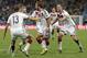 Germany's Mario Goetze (19) celebrates with teammates after scoring his side's first goal in extra time against Argentina's goalkeeper Sergio Romero during the World Cup final soccer match between Germany and Argentina at the Maracana Stadium in Rio de Janeiro, Brazil, Sunday, July 13, 2014. (AP Photo/Felipe Dana)