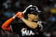 Jul 8, 2014; Phoenix, AZ, USA; Miami Marlins right fielder Giancarlo Stanton (27) looks on during the third inning against the Arizona Diamondbacks at Chase Field. Mandatory Credit: Matt Kartozian-USA TODAY Sports