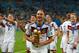 RIO DE JANEIRO, BRAZIL - JULY 13: Benedikt Hoewedes of Germany celebrates with the World Cup trophy and celebrates with teammates after defeating Argentina 1-0 in extra time during the 2014 FIFA World Cup Brazil Final match between Germany and Argentina at Maracana on July 13, 2014 in Rio de Janeiro, Brazil. (Photo by Clive Rose/Getty Images)