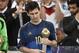 Germany's goalkeeper Manuel Neuer, left, winner of the Golden Glove award for best goalkeeper, stands with Argentina's Lionel Messi, right, winner of the Golden Ball award as the tournament's top player, after the World Cup final soccer match between Germany and Argentina at the Maracana Stadium in Rio de Janeiro, Brazil, Sunday, July 13, 2014. Germany won the match 1-0. (AP Photo/Martin Meissner)