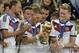 Germany's Bastian Schweinsteiger looks at the trophy after the World Cup final soccer match between Germany and Argentina at the Maracana Stadium in Rio de Janeiro, Brazil, Sunday, July 13, 2014. Germany beat Argentina 1-0 to win the World Cup. (AP Photo/Victor R. Caivano)