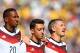 RIO DE JANEIRO, BRAZIL - JULY 04: (L-R) Jerome Boateng, Mesut Oezil and Bastian Schweinsteiger of Germany sing the National Anthem prior to the 2014 FIFA World Cup Brazil Quarter Final match between France and Germany at Maracana on July 4, 2014 in Rio de Janeiro, Brazil. (Photo by Julian Finney/Getty Images)