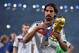 RIO DE JANEIRO, BRAZIL - JULY 13: Sami Khedira of Germany celebrates with the World Cup trophy after defeating Argentina 1-0 in extra time during the 2014 FIFA World Cup Brazil Final match between Germany and Argentina at Maracana on July 13, 2014 in Rio de Janeiro, Brazil. (Photo by Matthias Hangst/Getty Images)
