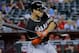 Florida Marlins' Giancarlo Stanton hits against the Arizona Diamondbacks during the first inning of a baseball game, Monday, July 7, 2014, in Phoenix. (AP Photo/Matt York)
