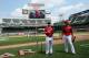 Jul 13, 2014; Minneapolis, MN, USA; USA outfielder Jesse Winker (left) and pitcher Robert Stephenson (right) stand on the field before the All Star Futures Game at Target Field. Mandatory Credit: Jerry Lai-USA TODAY Sports