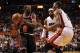 Apr 14, 2013; Miami, FL, USA; Chicago Bulls small forward Luol Deng (9) is defended by Miami Heat center Chris Bosh (1) and small forward LeBron James (6) during the first half at American Airlines Arena. Mandatory Credit: Steve Mitchell-USA TODAY Sports