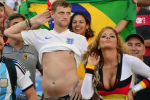 England Fan Mocks Posing German Fan