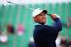 HOYLAKE, ENGLAND - JULY 13: Tiger Woods of the USA tees off on the 4th hole during a practice round ahead of the 143rd Open Championship at Royal Liverpool on July 13, 2014 in Hoylake, England. (Photo by Matthew Lewis/Getty Images)