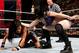 Paige works over AJ Lee