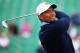 HOYLAKE, ENGLAND - JULY 13: Tiger Woods of the USA tees off on the 4th hole during a practice round ahead of the 143rd Open Championship at Royal Liverpool on July 13, 2014 in Hoylake, England. (Photo by Matthew Lewis/Getty Images)