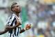 Juventus midfielder Paul Pogba of France celebrates after scoring, during a Serie A soccer match between Torino and Juventus, at the Olympic stadium, in Turin, Italy, Sunday, Sept. 29, 2013. (AP Photo/Massimo Pinca)