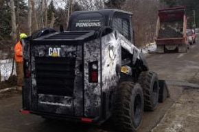 Penguins Fan Drives Away with Customized Skid Steer