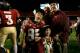 The Fisher family celebrates the 2013 Orange Bowl win. Ethan (front) and Trey (left) join Candi and Jimbo Fisher.