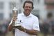 Phil Mickelson of the United States holds up the Claret Jug trophy after winning the British Open Golf Championship at Muirfield, Scotland, Sunday July 21, 2013. (AP Photo/Scott Heppell)